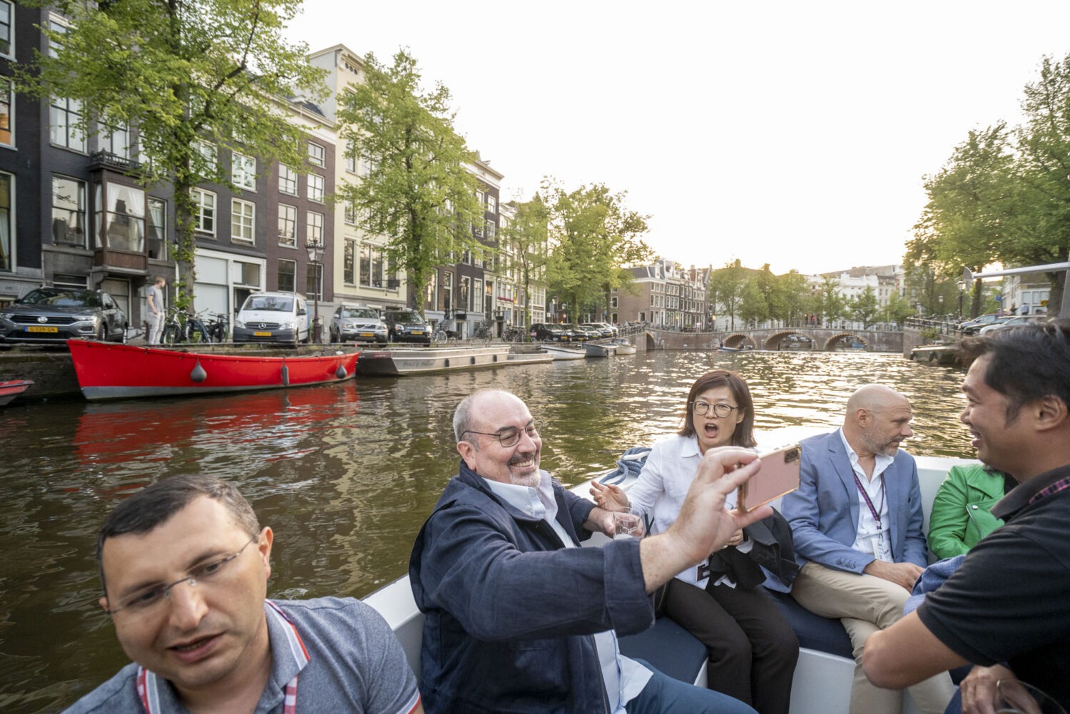 In Amsterdam photographer corporate event with boat to party